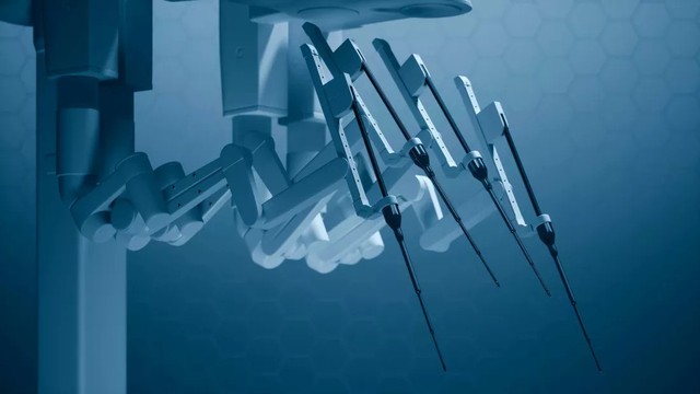 Bác sĩ điều khiển robot phẫu thuật ung thư từ khoảng cách 2.400 km - Ảnh 1.