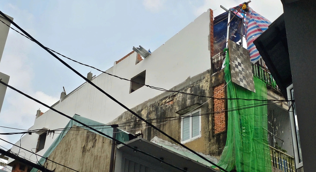 Nh&agrave; tập thể hơn 50 năm ở TP . HCM xuống cấp , cư d&acirc;n lo ngại cải tạo tầng 4 - Ảnh 1.