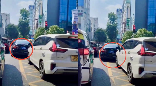 Xe biển xanh ở TP.HCM đ&egrave; vạch mắt v&otilde;ng bị người d&acirc;n quay clip gửi Cục CSGT - Ảnh 1.