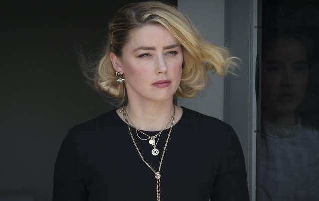 Amber Heard lui về ở ẩn c&ugrave;ng 3 con sau s&oacute;ng gi&oacute;- Ảnh 3.