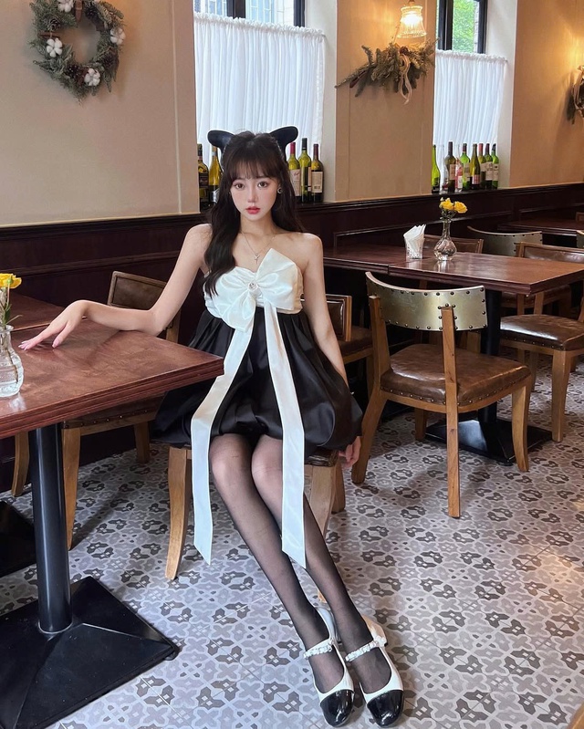 Đầm đính hoa và nơ 3D tạo điểm nhấn kiêu sa cho nàng - Ảnh 2.