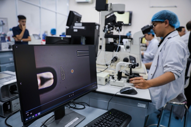 Tháo gỡ các điểm nghẽn về thể chế để đại học quốc gia phát triển - Ảnh 1.