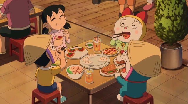 Doraemon, Nobita du lịch Việt Nam, thích thú ăn bánh mì, cơm tấm - Ảnh 2.