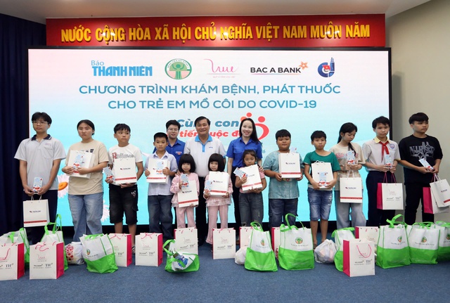 Trẻ mồ côi do Covid-19 ấm lòng, vui tươi trong ngày hội sức khỏe- Ảnh 7. Trẻ mồ côi do Covid-19 ấm lòng, vui tươi trong ngày hội sức khỏe- Ảnh 7.