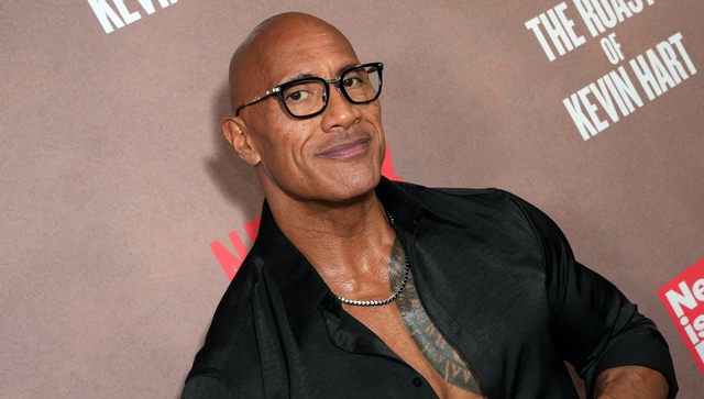 The Rock 'đáp trả' khi bị chế giễu bán dầu gội dù… không có tóc - Ảnh 1.