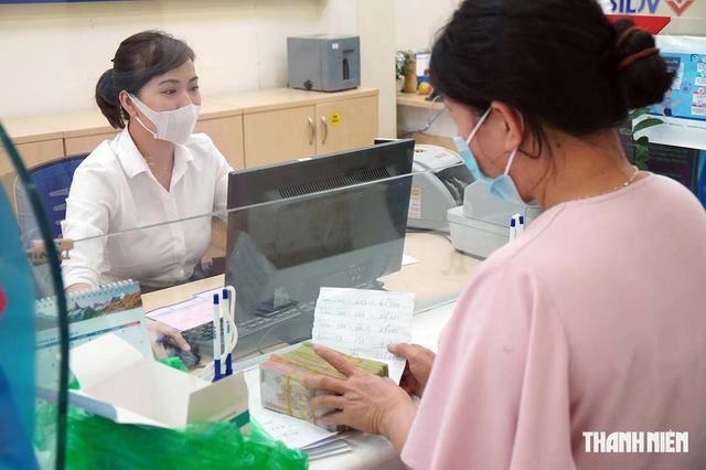 Lãi suất tiết kiệm 'âm thầm' tăng- Ảnh 1.