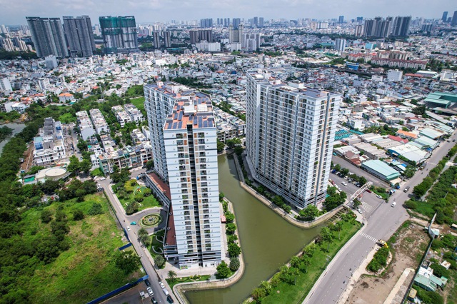 Vì sao gỡ vướng cấp sổ hồng cho người mua nhà ở TP.HCM mất nhiều thời gian? - Ảnh 1.