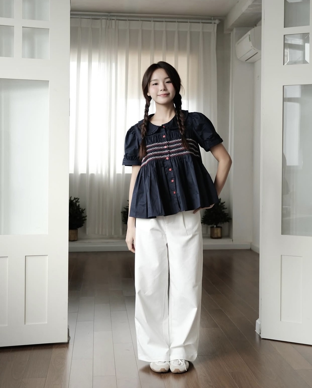 Tho&aacute;t m&aacute;c điệu đ&agrave; với sự biến tấu từ &aacute;o blouse tay phồng c&ugrave;ng quần jeans - Ảnh 2.