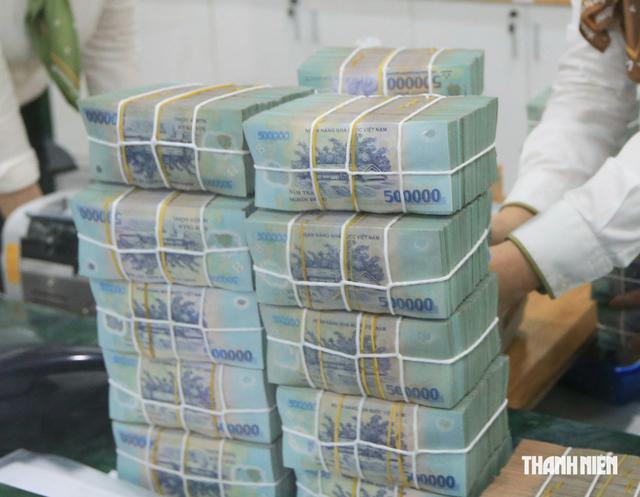 Tăng tỷ lệ tiền gửi Kho bạc Nhà nước vào vốn huy động ngân hàng lên 50%- Ảnh 1.