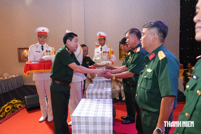 Đẩy mạnh t&igrave;m kiếm, quy tập 7.000 h&agrave;i cốt liệt sĩ 'đến khi kh&ocirc;ng c&ograve;n th&ocirc;ng tin' - Ảnh 4.