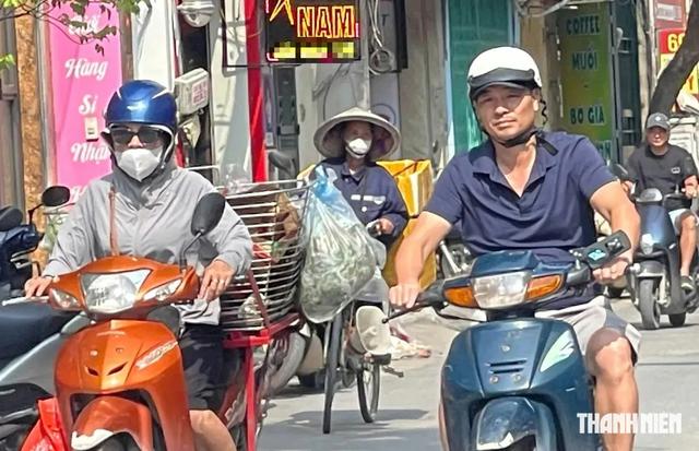 &Aacute;p thấp nhiệt đới suy yếu, nắng n&oacute;ng trở lại miền Bắc, miền Trung - Ảnh 2.