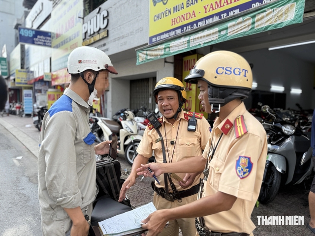Xe máy qua nhiều đời chủ, thiếu giấy tờ mua bán có sang tên được không?- Ảnh 1.