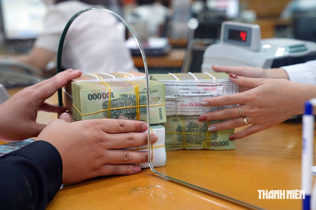Lãi suất neo cao, tỷ giá hối đoái diễn biến ngược- Ảnh 1.