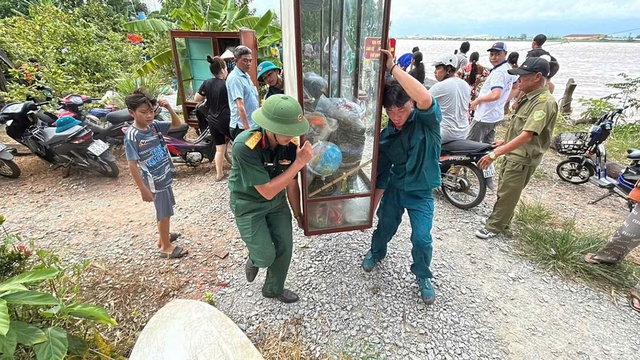Sống bất an bên bờ sông sạt lở - Ảnh 2.