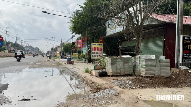 Người dân TP.HCM nhận hỗ trợ giải tỏa đường ĐT.744 do chậm trả, cao nhất 620 triệu - Ảnh 2.