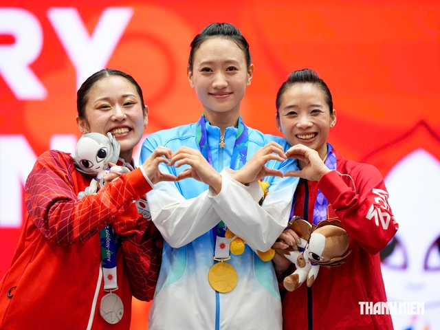 Đằng sau tấm HCĐ quý như vàng của 'nữ hoàng wushu' Dương Thúy Vi: Kỳ ASIAD thứ 4…- Ảnh 4.