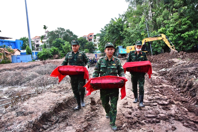 Quy tập 672 hài cốt liệt sĩ tại công viên Lê Thị Riêng- Ảnh 1.