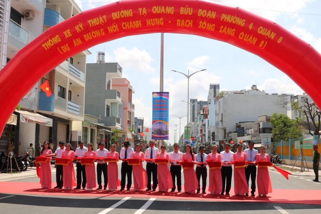 Người dân vui mừng khi đường Tạ Quang Bửu thông xe sau 23 năm- Ảnh 1.