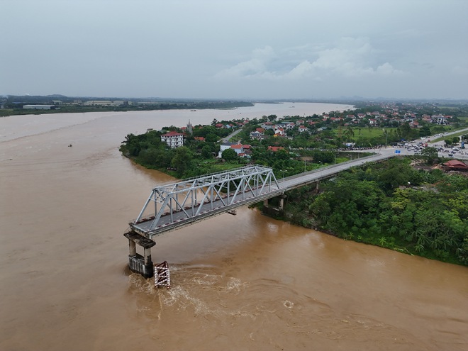 Nạn nhân vụ sập cầu Phong Châu: ‘Tôi như được sinh ra lần thứ 2’- Ảnh 2. Nạn nhân vụ sập cầu Phong Châu: ‘Tôi như được sinh ra lần thứ 2’- Ảnh 2.