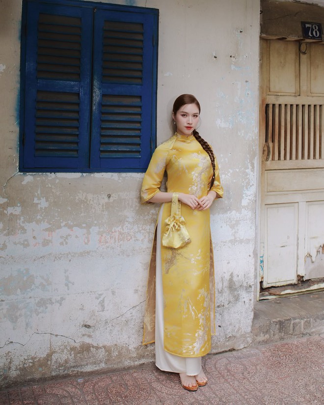 Brilliant New Year 2025 with yellow ao dai, lucky secret at the beginning of the year- Photo 6.