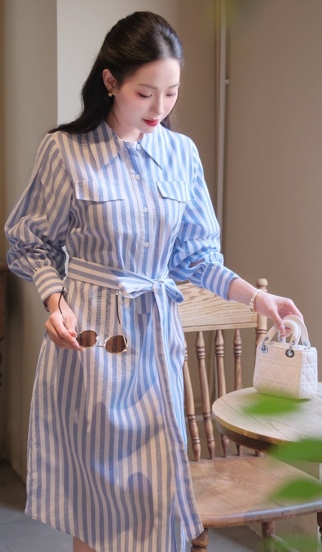 Khai mở nét thanh lịch, quyến rũ đầy ấn tượng cùng váy midi mùa thu(.) - Ảnh 7.