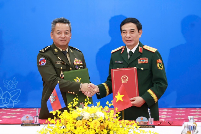 Giao lưu hữu nghị quốc phòng biên giới Việt Nam - Campuchia - Ảnh 12.