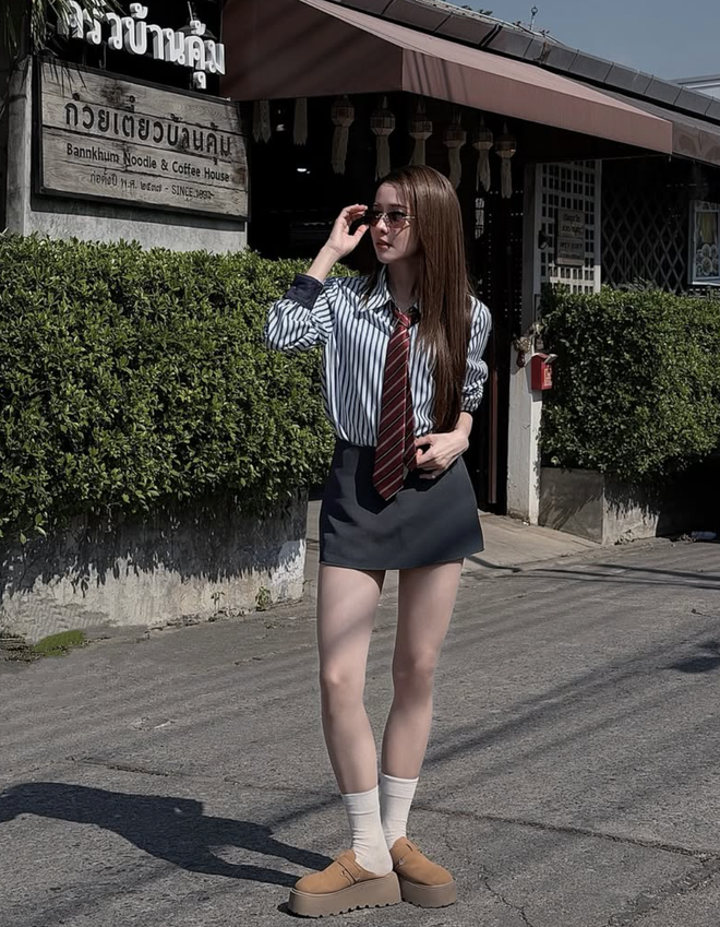 Áo sơ mi kẻ sọc tạo nên sự cân bằng giữa cổ điển và hiện đại - Ảnh 2.