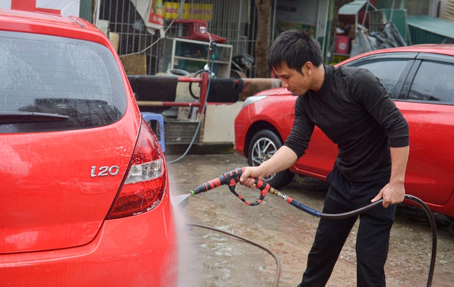 Giá tăng từng ngày, dịch vụ rửa xe 'hốt bạc' dịp cận tết- Ảnh 5. Giá tăng từng ngày, dịch vụ rửa xe 'hốt bạc' dịp cận tết- Ảnh 5.