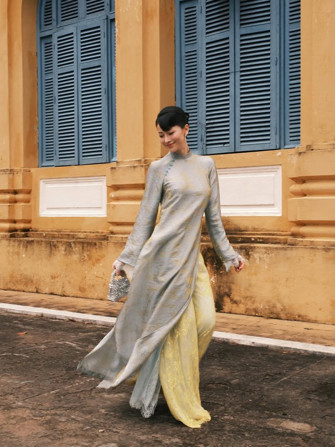 Áo dài xanh dương và khả năng tôn da ấn tượng- Ảnh 6.