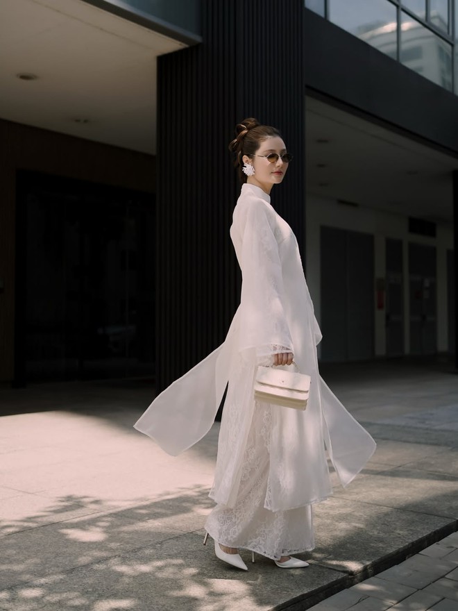 Áo dài trắng thăng hoa trong mùa tết- Ảnh 5.