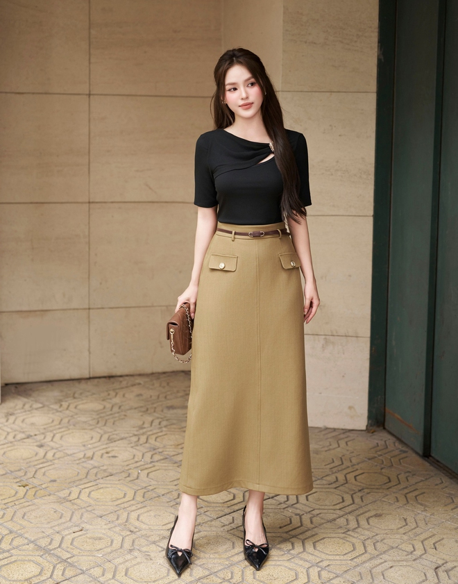 Nâng tầm thời trang công sở cùng váy dài, quần ống rộng và giày cao gót- Ảnh 9. Nâng tầm thời trang công sở cùng váy dài, quần ống rộng và giày cao gót- Ảnh 9.