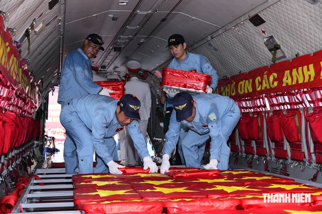 Chuyến bay đặc biệt chở hơn 7.000 mẫu hài cốt liệt sĩ giám định ADN - Ảnh 9.