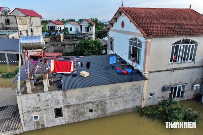 Nước sông Bùi vượt báo động 3, hơn 600 người dân vùng 'rốn lũ' phải sơ tán - Ảnh 4.