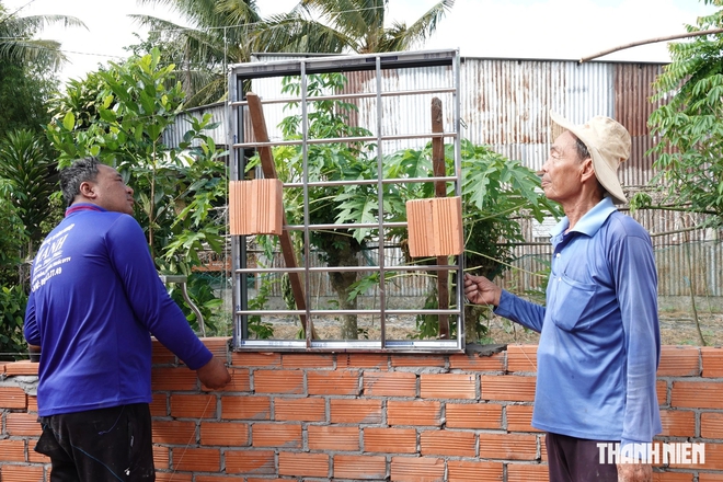 Những lão nông 20 năm dựng mái ấm cho người nghèo- Ảnh 1.