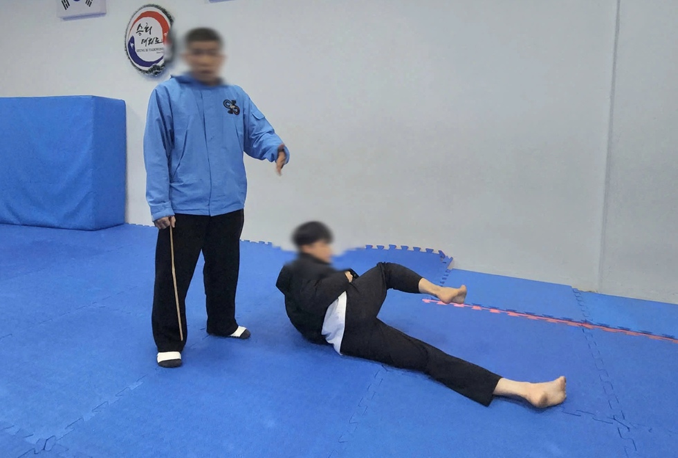 Diễn biến mới nhất vụ HLV taekwondo bị tố đánh học viên: Đình chỉ hoạt động CLB- Ảnh 1.