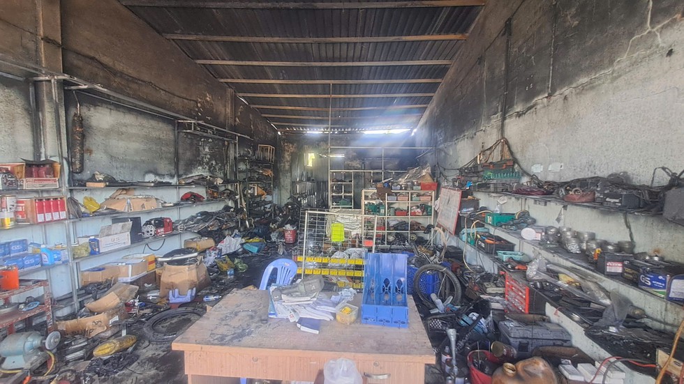 Điều tra vụ ch&aacute;y tiệm sửa xe đạp điện khiến 2 anh em ruột tử vong- Ảnh 2.