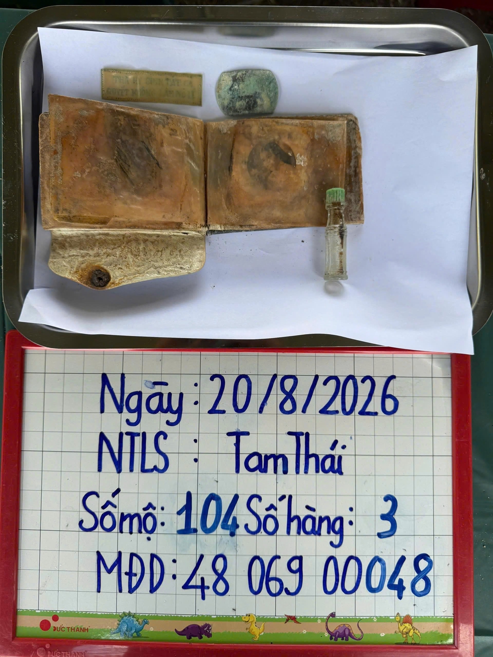 Tìm danh tính liệt sĩ, bất ngờ với bức ảnh phụ nữ trong chiếc ví- Ảnh 1.