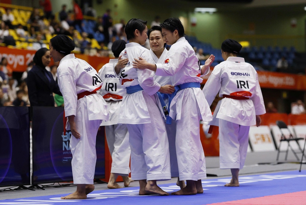 Đồng đội nữ kata Việt Nam tái lập kỳ tích HCV ASIAD- Ảnh 2.
