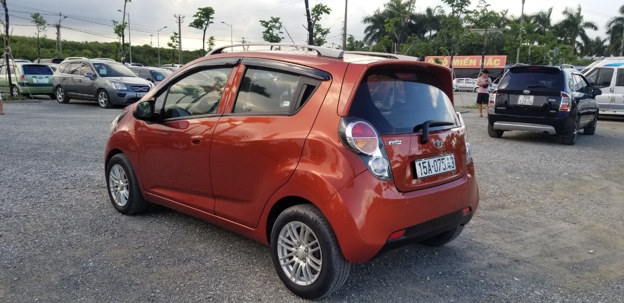 Bán xe Daewoo Matiz Groove 10 AT 2009 màu trắng xe nhập