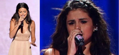 Selena đưa câu chuyện tình nhiều nước mắt của mình lên sân khấu AMAs 2014 - Ảnh: Youtube