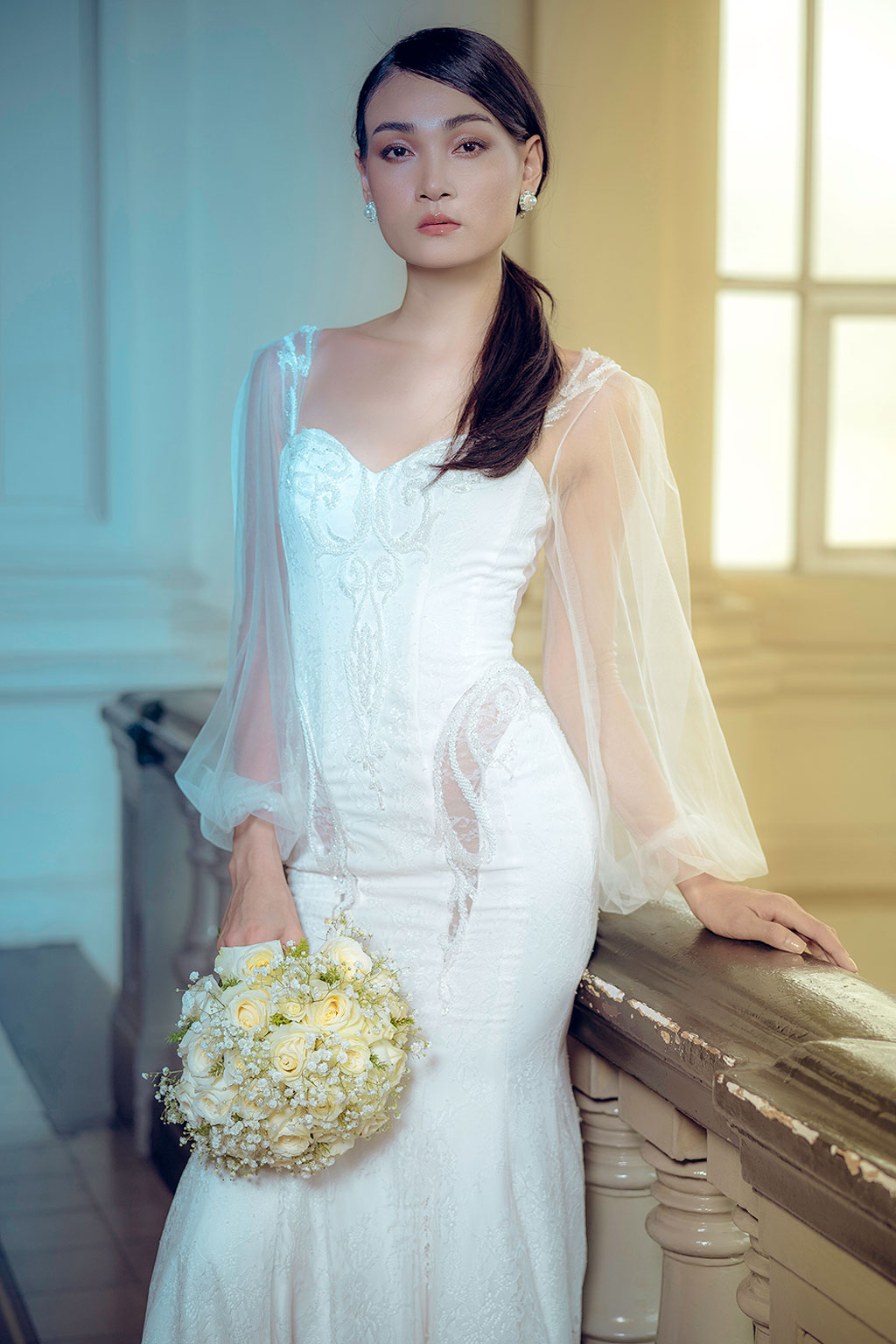 Người mẫu Thùy Trang đẹp lạnh lùng trong váy cô dâu7