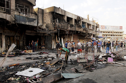 Hiện trường một vụ tấn công của IS ở Iraq - Ảnh: Reuters