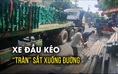 Xe đầu kéo đang chạy gặp sự cố, sắt thép tràn xuống đường