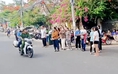 Thí sinh ngủ quên, công an đến tận nhà đón đi thi