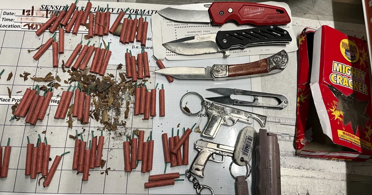 The US forces passengers to carry firecrackers and weapons in their carry-on luggage