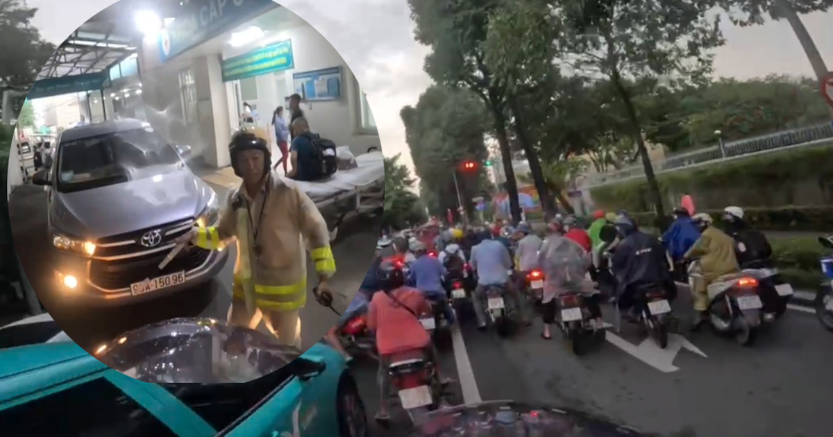 CSGT TP.HCM hụ c&ograve;i rẽ d&ograve;ng kẹt xe chiều mưa đưa người đột quỵ đi cấp cứu