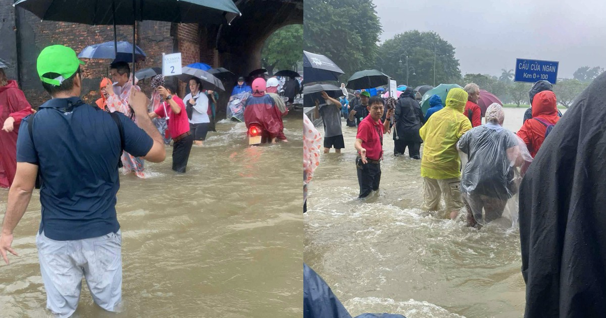 Kh&aacute;ch T&acirc;y &#039;vượt lũ&#039; ở Huế: Đến s&acirc;n bay bằng đ&ograve;, lội nước tham quan Đại nội