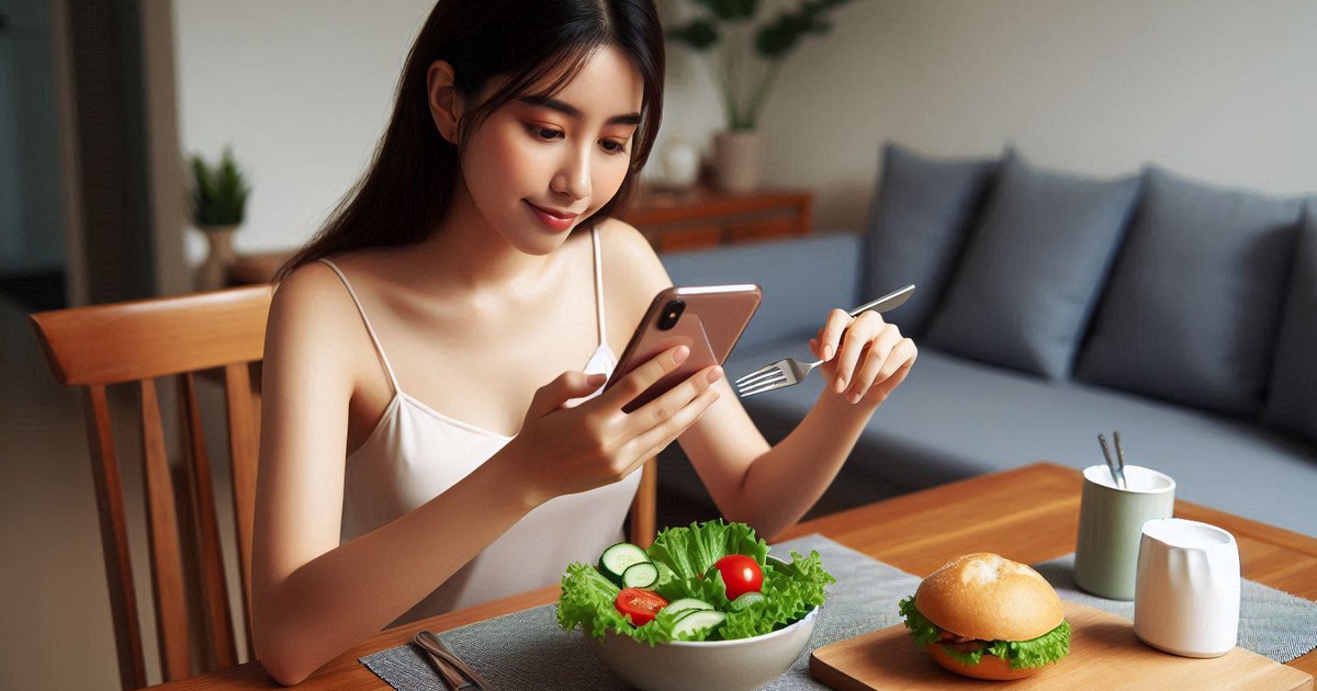 Khoa học nói gì về việc 'vừa ăn vừa dùng điện thoại'?