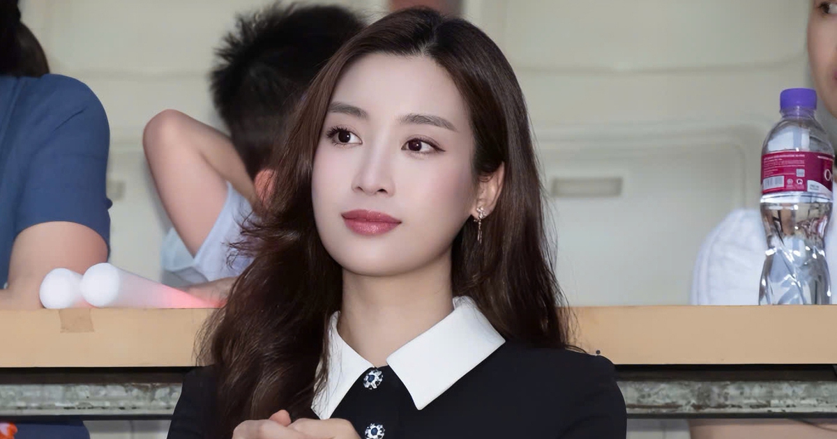 Hoa hậu Đỗ Mỹ Linh mặc thanh lịch đi cổ vũ chồng