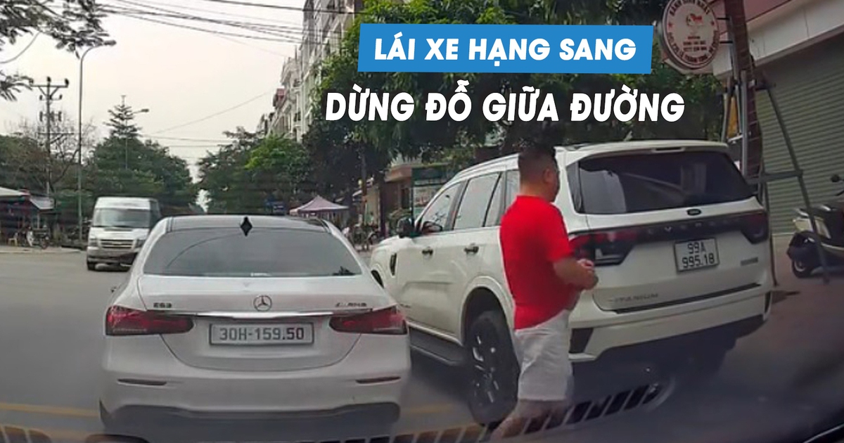 Bức xúc tài xế ngang nhiên dừng đỗ ô tô giữa đường, mặc kệ các xe khác